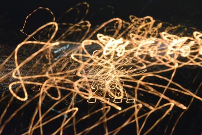Close-up of illuminated lights at night