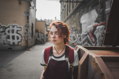 Portrait of young woman looking away