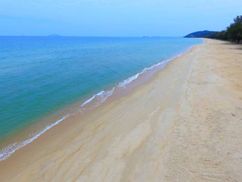 Scenic view of beach against clear sky