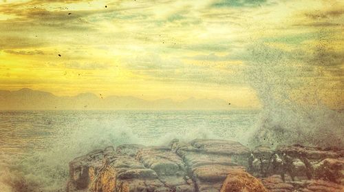 Scenic view of sea against sky during sunset