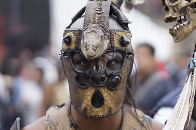 Close-up portrait of mature man wearing mask