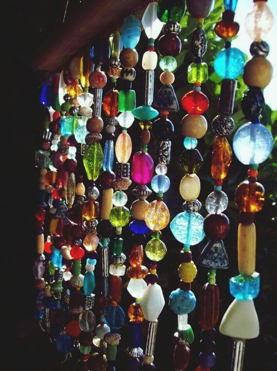 multi colored, large group of objects, abundance, hanging, indoors, decoration, variation, choice, in a row, lighting equipment, celebration, cultures, tradition, illuminated, colorful, arrangement, low angle view, retail, collection, close-up