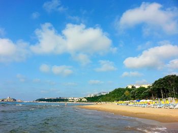 Scenic view of sea against cloudy sky