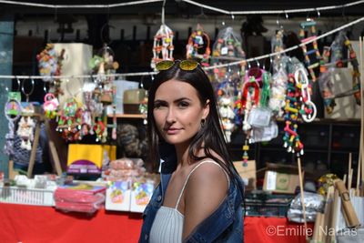 Portrait of woman standing in store