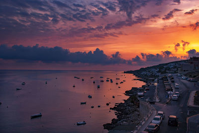 High angle view of sea against sky during sunset