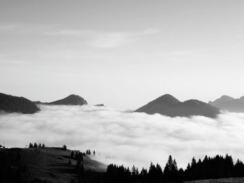 Scenic view of silhouette mountains against sky