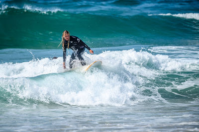 Man surfing in sea