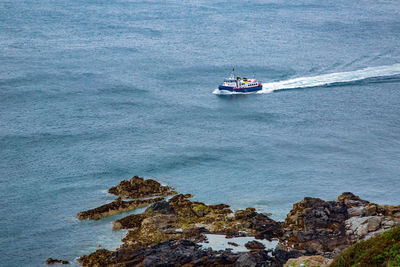 High angle view of ship sailing on sea