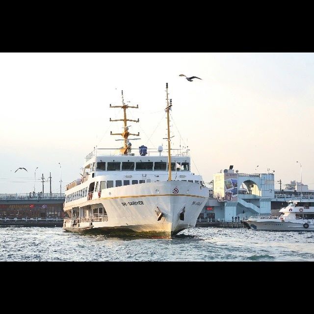 transportation, mode of transport, nautical vessel, boat, moored, water, harbor, transfer print, ship, airplane, sky, public transportation, travel, mast, clear sky, freight transportation, sea, air vehicle, auto post production filter, outdoors