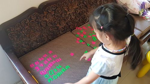 High angle view of girl at home