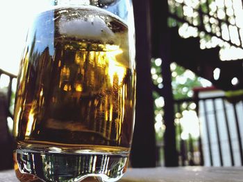 Close-up of beer glass on table