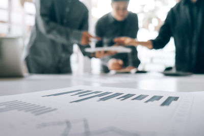 Group of people working on table