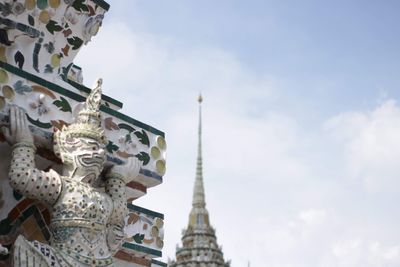 Pagodas and their sculptures at wat arun, bangkok