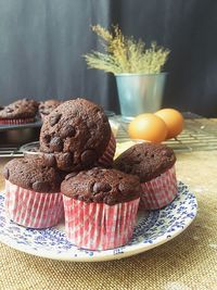 Close-up of muffins in plate on table