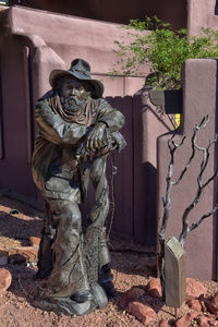 Statue against wall