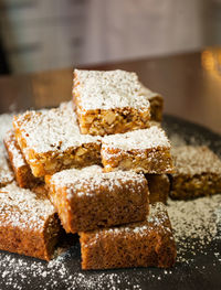 Homemade delicious blonde brownies. closeup chocolate cake.