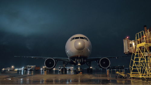 Airplane against sky at night