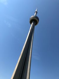 Low angle view of communications tower against sky