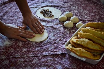 High angle view of woman preparing food