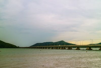Scenic view of bay against sky