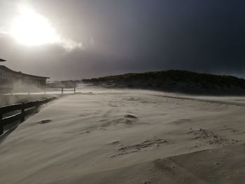 Scenic view of beach against sky