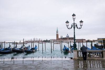 Boats moored at dock