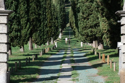 High angle view of people walking on footpath