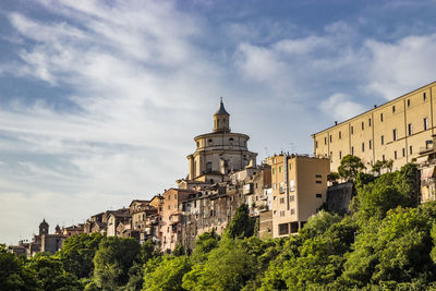 Low angle view of buildings against sky