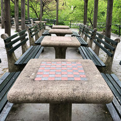 High angle view of bench in park