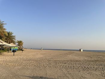 Scenic view of beach against clear sky