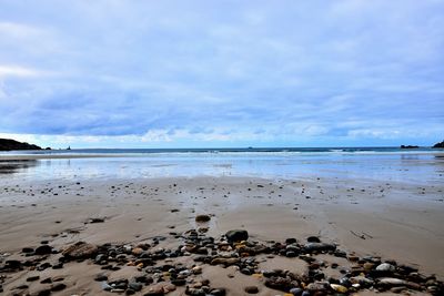 Scenic view of beach against sky