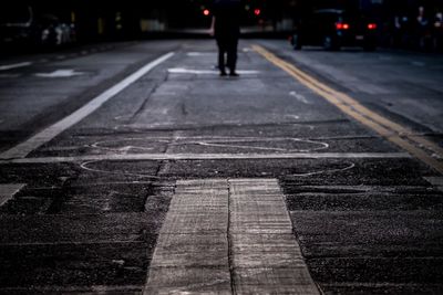 People walking on road at night