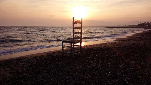 Scenic view of sea at sunset