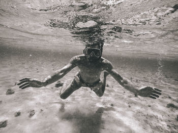 Man swimming in sea