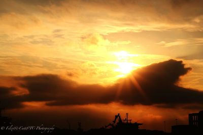 Low angle view of cloudy sky at sunset