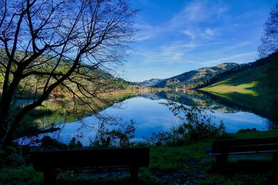Scenic view of lake against blue sky