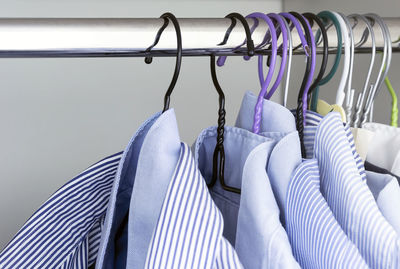 Close-up of clothes hanging on rack