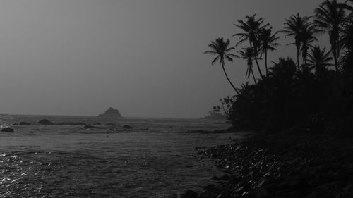 Scenic view of sea against clear sky