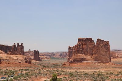 Rock formations at arches national park against sky