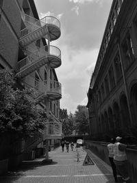 View of buildings in city against sky