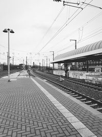 Railroad station platform against sky