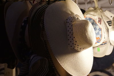 Close-up of hat hanging for sale at market