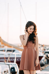 Young woman standing outdoors