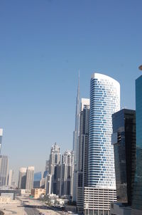 Modern buildings against clear sky