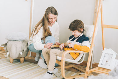 Women sitting on chair