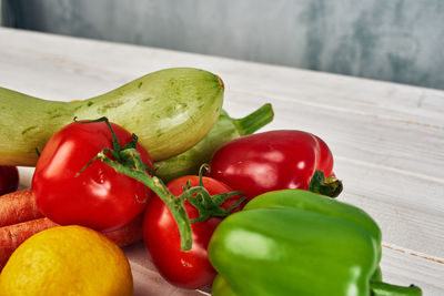 Close-up of red bell peppers on table