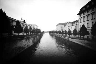 View of canal along buildings