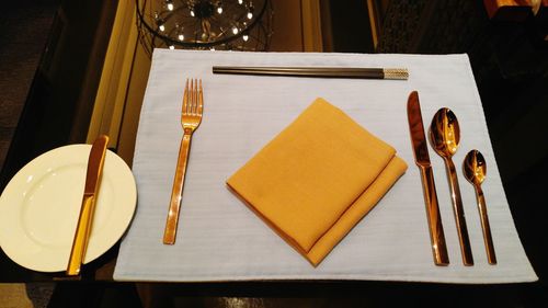 Close-up of place setting on table