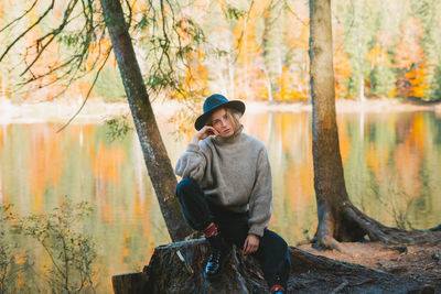 Portrait of man in forest during autumn