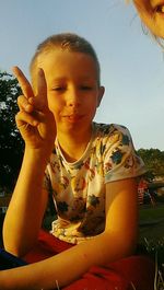 Portrait of cute boy drinking water